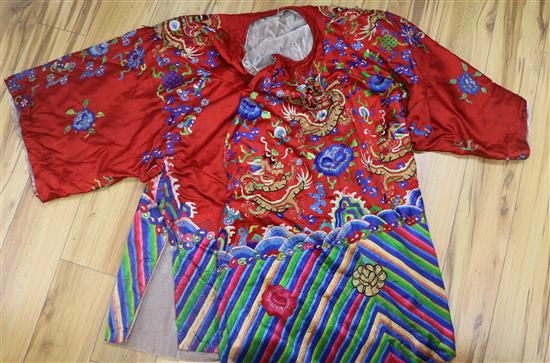 An early 20th century red satin dragon robe